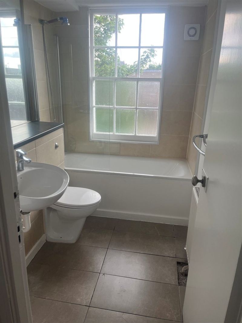 Angel flat bathroom before